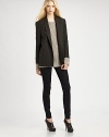 Tailored with an oversized silhouette, this wool blazer finishes the look with dropped shoulder and front patch pockets. Notched lapelsDropped shouldersLong sleevesButton frontFront patch pocketsFully linedAbout 28 from shoulder to hemWoolDry cleanImported of Italian fabricModel shown is 5'9½ (176cm) wearing US size 4.