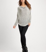 Slouchy, textured-knit cowlneck with long dolman sleeves and a curved hi-low hem. CowlneckDropped shouldersLong dolman sleevesCurved hi-low hemLonger length hits below the hips71% viscose/24% polyester/5% spandexDry cleanMade in USAModel shown is 5'11 (180cm) wearing US size 4.