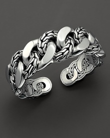 Link chains interwoven to create a kick cuff. Designed by John Hardy. Link chains interwoven to create a kick cuff. Designed by John Hardy.