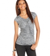 DKNY Jeans updates a basic petite top with a fierce animal print! Wear it with jeans, skirts and more!