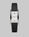 A classic rectangular design with subtle, tonal check details.Swiss quartz movement Water resistant to 3 ATM Stainless steel rectangular case, 20mm x 26mm, (.78 x 1.02) Silver sunray dial Roman numeral and index hour markers Check embossed strap, 14mm, (0.55) Deployment buckle Made in Switzerland 