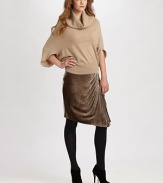 A draped funnel neck and full sleeves give this relaxed layer sophisticated style.Draped funnel neckFull sleevesDraped backCashmereDry cleanImportedModel shown is 5'10½ (179cm) wearing US size Small.