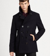 A classic double-breasted peacoat with modern shaping has an urban edge, in a rich wool blend.Oversized collarExtended lapelsDouble-breasted button closeVertical front welt pocketsBack half beltBack seamed detailingCenter back ventAbout 29 from shoulder to hemWool/nylonDry cleanImported