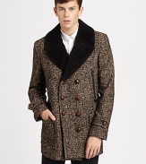 Handsome wool tweed is impeccably tailored in a sleek, double-breasted silhouette, finished with ample front pockets and a back vent.Button frontChest welt pocketWaist flap pocketsRear ventAbout 33 from shoulder to hemWool/nylon/mohair/alpacaDry cleanImported