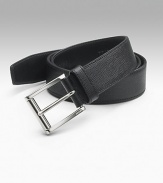 Prada logo buckle with etched detail and saffiano leather strap. Black has black stitching and black interior About 1½ wide Made in Italy 