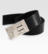 Italian calfskin leather with a signature Medusa buckle. Reverses from textured to smooth About 1¼ wide Made in Italy 