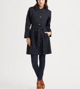 Classic trench styling in a single-breasted silhouette of lightweight cotton twill.Point collarEpaulettesRaglan sleevesSingle-breasted button frontSelf-beltSlash pocketsBack ventAbout 20 from shoulder to hemCottonDry cleanImportedModel shown is 5'8½ (174cm) wearing US size Small.