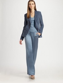 This supple wide-legged style is rendered in a luxe satin blend.Self waistbandBack button welt pocketConcealed side zipInseam, about 36¼SilkDry cleanMade in USA of imported fabricModel shown is 5'10 (177) wearing US size 4. 