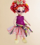 Based on the character from the book by Jane O'Connor and illustrated by Robin Preiss Glasser, this doll has wild red yarn hair, decorated with bows, butterflies, a crown and other fancy stuff. Fancy Nancy is wearing a bright colorful dress with lots of sparkels, glitter and glitz. Her pink sunglasses are her special trademark. 18H X 5½W X 3D About 1¼ pounds Recommended for ages 3 to 7Please note: Book sold separately. 