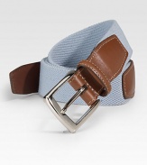 EXCLUSIVELY OURS. We've added a hint of stretch ease to a classic look, lending superior comfort to an all-season style. Kipskin tabs Nickle-plated buckle About 1¼ wide Made in USA 