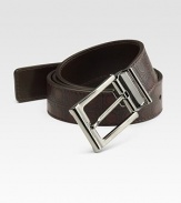 Sleek calfskin leather, crafted in Italy with embossed gancio texture and a gunmetal buckle. About 1¼ wide Made in Italy 