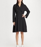 A refined, feminine take on the classic trench, tailored with a full-skirted silhouette.Foldover collar with hook-and-eye closuresDouble-breasted button frontBodice pleatsLong sleevesFull skirtAbout 39 from shoulder to hem65% polyester/35% woolDry cleanImportedModel shown is 5'11 (180cm) wearing US size Small. 