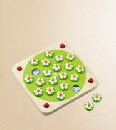 Like many of the world's best games, this one has simple rules: there is a board of daisies and the object is to win as many as possible. Each player takes turns pulling up pairs of daisies. If what is under the daisies matches, the player keeps them; if not, they're returned to the board. As play continues, the choices become less random and players try to remember what is under the daisies already played.