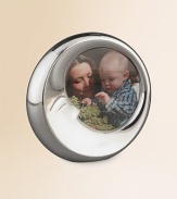 A tender touch for the nursery or nightstand, handcrafted from gleaming alloy in an elongated crescent moon design with sleepy, man-in-the-moon features. Accommodates a 4 diam photograph Wipe clean Imported 