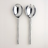 These metal salad servers with bamboo handles turn salad tossing into performance art. The bamboo hails from the rain forests of South America.