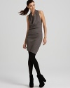 Streamline your day with office chic. This modern Helmut Lang dress boasts chic draping at the side on a lean silhouette.