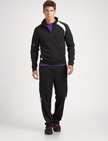 An essential style with sleek reflective details in a tightly-knit polyester for a smooth finish and soft hand.Elastic waist with drawstringAngled zip pocketsZip pockets at the thighsReflective piping on the sidesStraight leg with sewn hemRLX logo detailPolyesterMachine washImported An essential style with sleek reflective details in a tightly-knit polyester for a smooth finish and soft hand.Elastic waist with drawstringAngled zip pocketsZip pockets at the thighsReflective piping on the sidesStraight leg with sewn hemRLX logo detailPolyesterMachine washImported