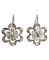 Crystal flower earrings that add light and life to your look. In silvertone mixed metal, by Betsey Johnson.