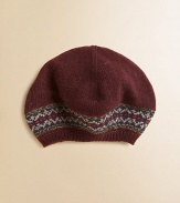 A classic beret is knit in a Fair Isle pattern from soft cotton and merino wool yarns to provide preppy style and superior warmth.Ribbed brimSeamed crown85% cotton/15% merino woolHand washImported