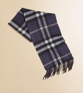 Exploded checks on plush cashmere enhances this luxurious winter staple.Fringed endsAbout 8 X 50CashmereDry cleanImported
