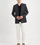 The next step in modern menswear: a blazer tailored from fine virgin wool with a concealed button closure and leather trim along the narrow lapel. Concealed two-button closureChest besom, waist flap pocketsFully linedAbout 29½ from shoulder to hemVirgin wool with lamb leatherDry cleanMade in Italy