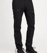 Metal zippers and grommets give a modern moto-inspired look to an essential cargo pant in lightweight cotton poplin. Belted waist with a double-snap closureAdjustable snap tabs at the side waist for a custom fitAllover silvertone grommets, zipper pulls and snapsTwo zip cargo pockets on each leg and two on the back waistRibbed-knit hem with drawcords for an adjustable fitInseam, about 32CottonMachine wash