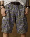 A rugged camo print accents these faded and frayed cargo shorts for an all-purpose, military-inspired look.