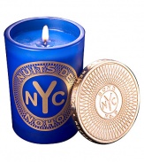 From a uniquely New York collection of scents, this avant garde aroma celebrates this urbane, downtown enclave.  · Blend of bergamot, jasmine and patchouli  · Made of the finest wax and wicks  · In sturdy, tinted glass container  · Gilt metal cap keeps scent from fading 