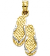 Add everyone's favorite warm-weather shoe to your collection. These fancy flip flops make the perfect addition to your beach collection. Crafted in 14k gold and sterling silver. Approximate length: 9/10 inch. Approximate width: 4/10 inch.
