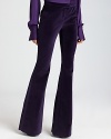 Flaunt luxe winter style in these flared Rachel Zoe velvet tuxedo pants. Pair with a billowy silk blouse for 70's chic.