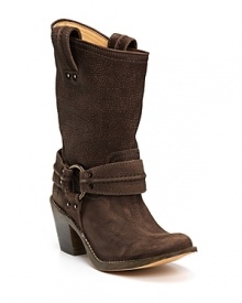 Pull-on short boots in distressed leather for a rugged look. Decorative harness strap at ankle and branded logo at side of heel. Round toe and 2.75 stacked heel. Leather lining and leather sole.