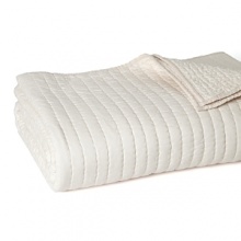 Cozy and luxurious, this Donna Karan quilt boasts an irregular stitch pattern for that heirloom, handcrafted look. Cozy and luxurious, this Donna Karan quilt boasts an irregular stitch pattern for that heirloom, handcrafted look.