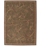 Bring a bit of natural elegance home. The Ashton House collection sets new standards of richness with their opulent colors, European-inspired decorative motifs, and luxuriously textured wool pile. This rug features an intricate and playful tossed flower design in earth tones on a mossy green background. Surrounded by an ornate border.