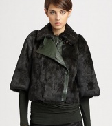 A timeless cropped staple of luxe rabbit fur paired with smooth leather in a contrasting hue. Point collar with leather lapel and buckle detailFront zip and hook-and-eye closuresThree-quarter length sleevesAbout 21 from shoulder to hemBody: Genuine dyed rabbit fur with leather trimFur origin: TurkeyLining: cottonDry cleanImportedModel shown is 5'10½ (179cm) wearing US size 4.