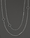 Fluted sterling silver necklace with circular and bar stations. An adjustable chain accommodates most Lagos clip pendants. Designed by Lagos.