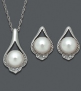 Add drama to any look with teardrops. This unique jewelry set features a matching pendant and earrings crafted from cultured freshwater pearls (6-7 mm), sparkling diamond accents and sterling silver. Approximate length: 18 inches. Approximate pendant drop: 3/4 inch. Approximate earrings drop: 1/2 inch.