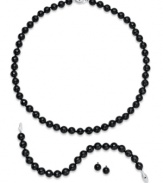Go bold. Black onyx beads (260 ct. t.w.) decorate this stand-out jewelry set. Includes a necklace, bracelet and pair of stud earrings. Set in sterling silver. Approximate length (necklace): 18 inches. Approximate length (bracelet); 7-1/2 inches. Approximate diameter (earrings): 1/4 inch.