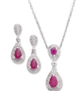 The perfect match. Sweet crimson rubies (1-1/5 ct. t.w.) and sparkling diamonds (1/10 ct. t.w.) adorn this beautiful earrings and pendant set. Crafted in sterling silver. Approximate length: 18 inches. Approximate drop: 1 inch. Approximate earring drop: 3/4 inch.