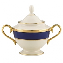 Inspired by privately commissioned presidential dinnerware, this fine china features stately navy bands and a gold border etched with patriotic stars. Inspired by privately commissioned presidential dinnerware, this fine china features stately navy bands and a gold border etched with patriotic stars.