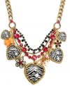 Perfect for the fierce fashionista. Betsey Johnson's elaborate frontal necklace combines zebra-print hearts, black and fuchsia crystal cup chains, an orange hippo, an ivory monkey, multicolored flowers, and crystal accents. Set in gold tone mixed metal. Approximate length: 15 inches + 3-inch extender. Approximate drop: 3 inches.