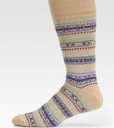 Colorful pattern is woven with a luxurious blend of stretch cotton.Mid-calf height45% cotton/44% nylon/8% other fibers/2% rubber/1% spandexMachine washImported