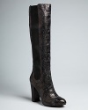 Juicy Couture adds sensational style to tall, basics boots with snake-embossed leather, top to toe. Full-length gored panels make for the perfect fit.