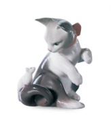 Watch the classic game of cat and mouse unfold with this irresistible figurine, handcrafted in premium Lladro porcelain.