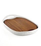 Create a table of content. A clean & simple sophistication exudes from this French White serving platter. Perfect for serving appetizers, like cheese & crackers, dips and entrees, like steaks & roasts, this hosting essential features a removable wood insert that doubles as a trivet.