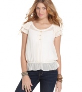 All about delicate style, this top from American Rag fuses sweet accents with an ever-so-slight blouson fit.