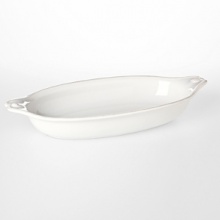 Whether an elegant or casual meal, this shallow Juliska baker dish from the Berry & Thread collection will look great on your table, bubbling with your favorite dish. Whether an elegant or casual meal, this shallow Juliska baker dish from the Berry & Thread collection will look great on your table, bubbling with your favorite dish.