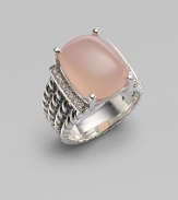From the Wheaton Collection. A faceted cushion of milky pink opal, edged by rows of diamonds, in a wide cable band of sterling silver.Diamonds, 0.16 tcw Pink opal Sterling silver Width, about ½ Imported
