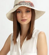 Soft linen, in a floppy style accented with a printed, ruched band of chiffon.Ruched chiffon bandBrim, about 3LinenHand washMade in USA of imported fabric