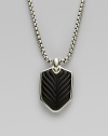 A cool and casual touch features a sterling silver dogtag-style pendant lined in chevron-textured onyx. From the Chevron Collection Black onyx Sterling silver Pendant, about 1 long Chain length, about 22 Lobster clasp Imported 