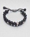 Smooth and polished beaded bracelet of black onyx and sterling silver with logo-engraved clasp.Black onyxSterling silverAdjustable claspAbout 2½ diam.Imported